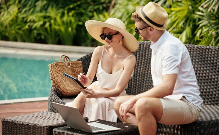 Couple having business meeting at resort