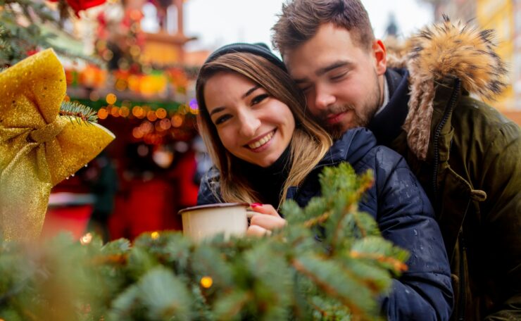 Young couple in Christmas market